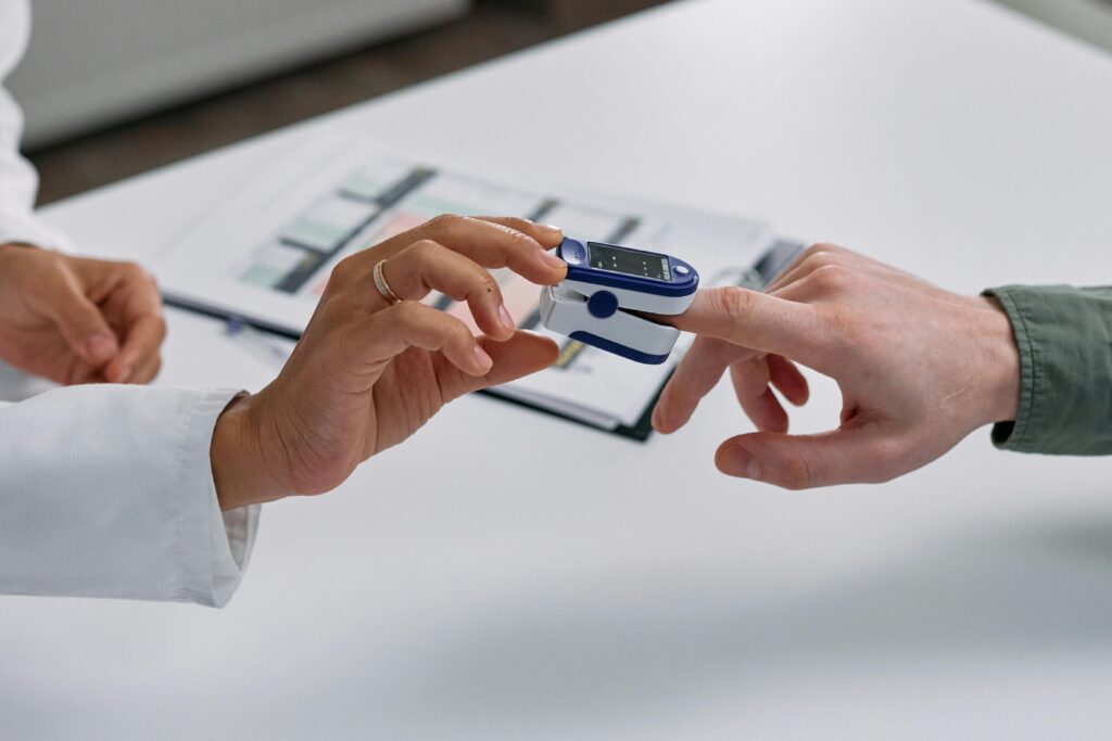 Benefits of jump rope Close-up of a fingertip pulse oximeter being used to measure a patient